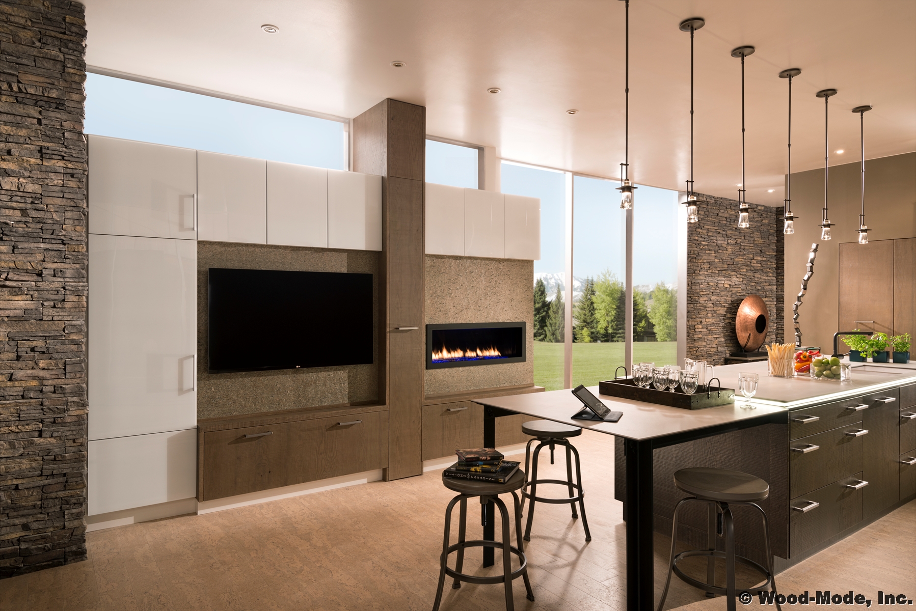 Earth inspired neutral colors expressed in basic materials with contrasting textures reinforce the connection of the natural and built environment. Nestled within the clean lines of the cabinetry lies a host of convenient storage items designed to make this kitchen a great place for cooking and entertaining.